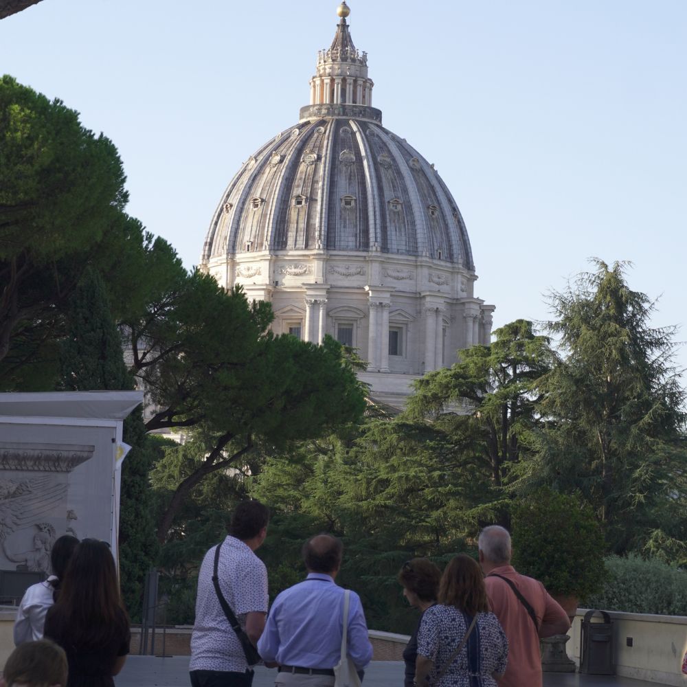 People Looking at St. Peter's Basilica during a Colosseum and Vatican Combo Tour