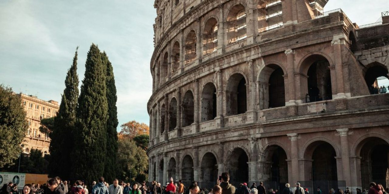 Group entering the Colosseum for a guided tour Colosseum and Forum experience